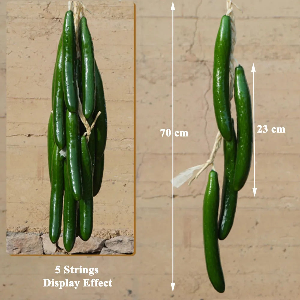 Artificial strings model assorted vegetables and fruits.