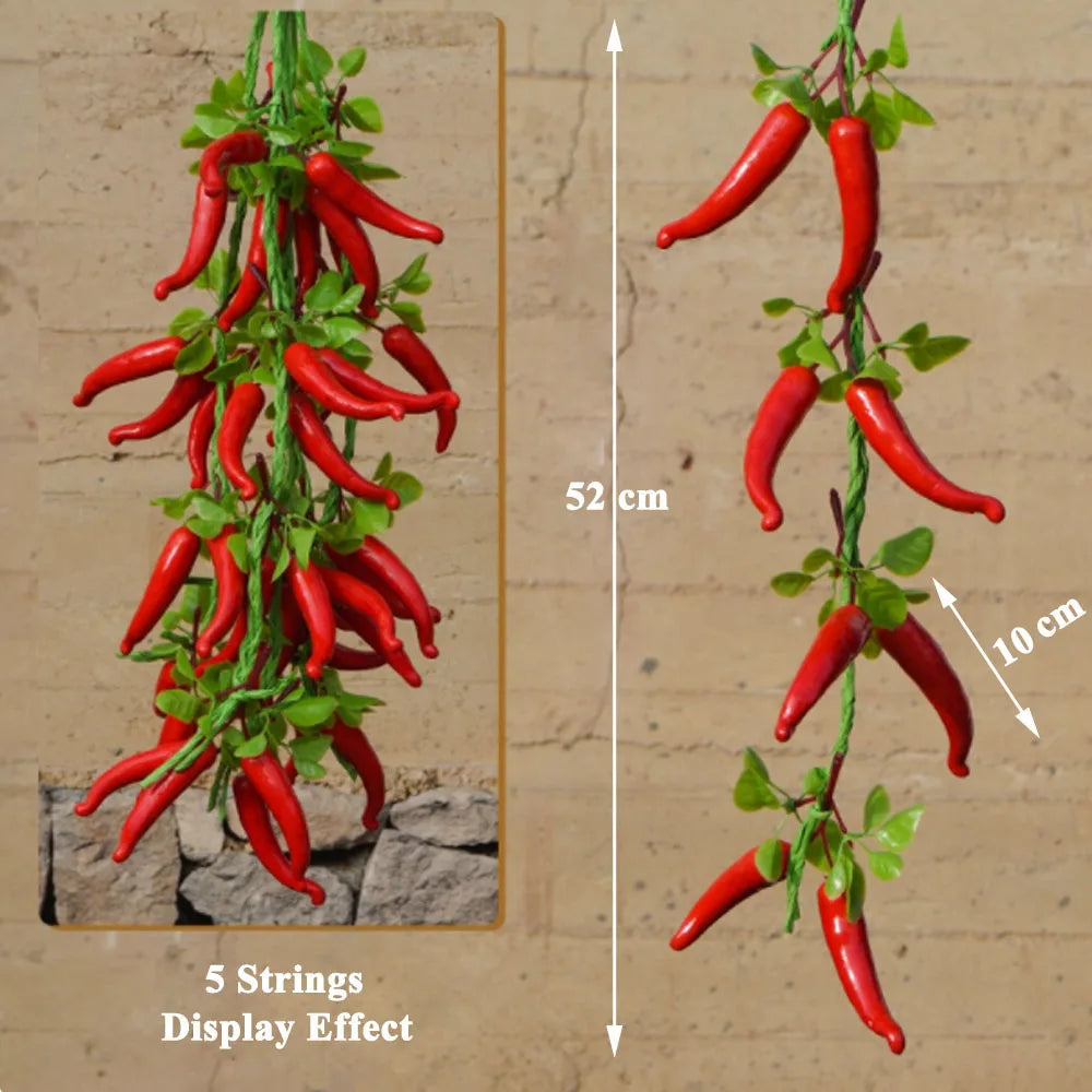 Artificial strings model assorted vegetables and fruits.
