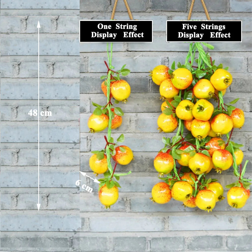 Artificial strings model assorted vegetables and fruits.