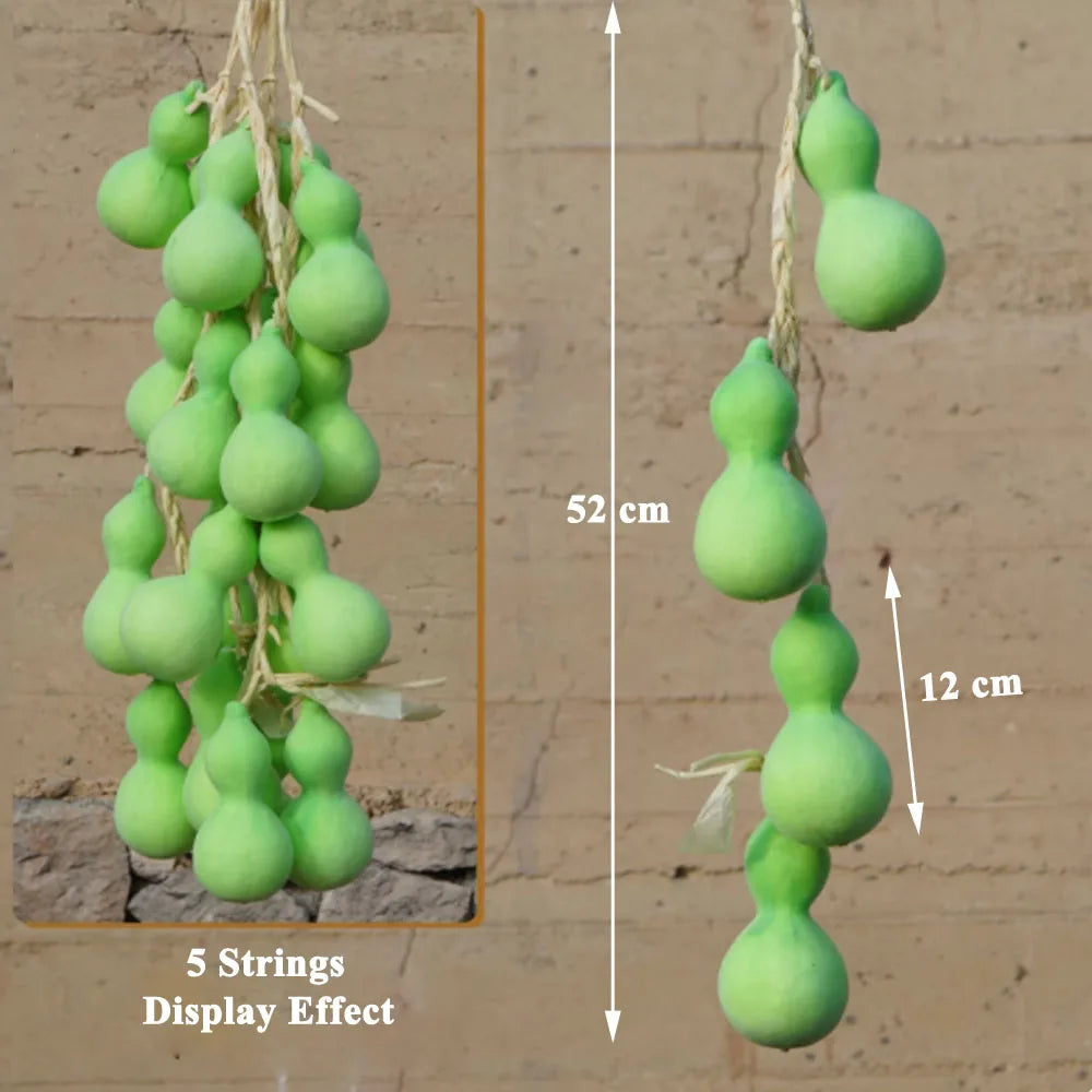 Artificial strings model assorted vegetables and fruits.