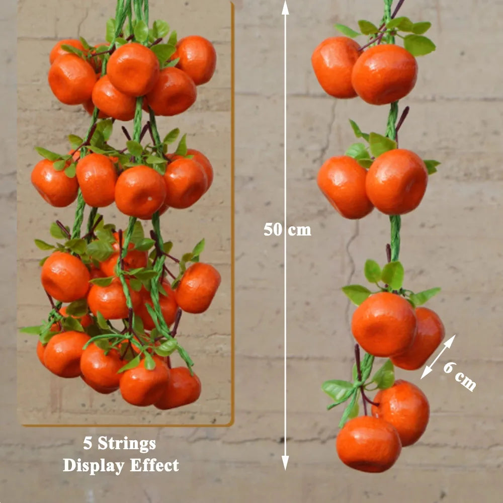 Artificial strings model assorted vegetables and fruits.