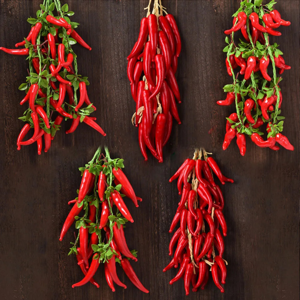 Artificial strings model assorted vegetables and fruits.