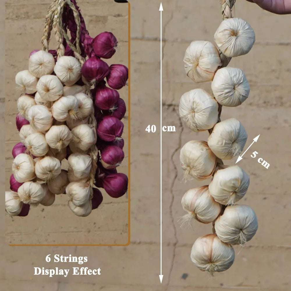 Artificial strings model assorted vegetables and fruits.