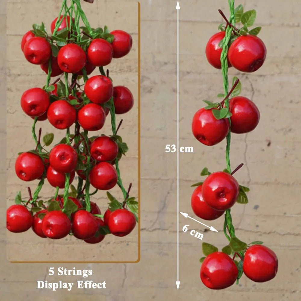 Artificial strings model assorted vegetables and fruits.