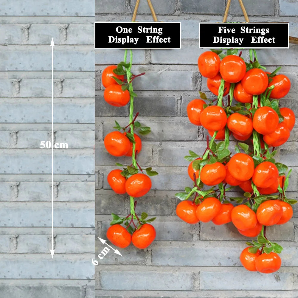 Artificial strings model assorted vegetables and fruits.