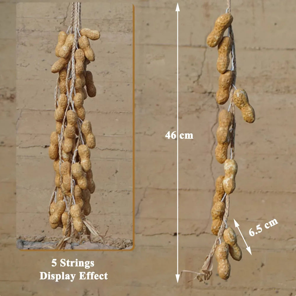 Artificial strings model assorted vegetables and fruits.