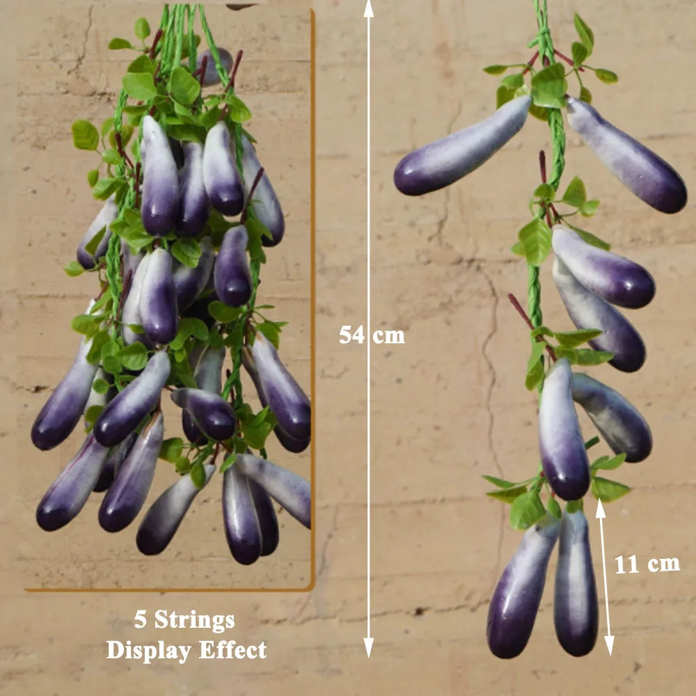 Artificial strings model assorted vegetables and fruits.